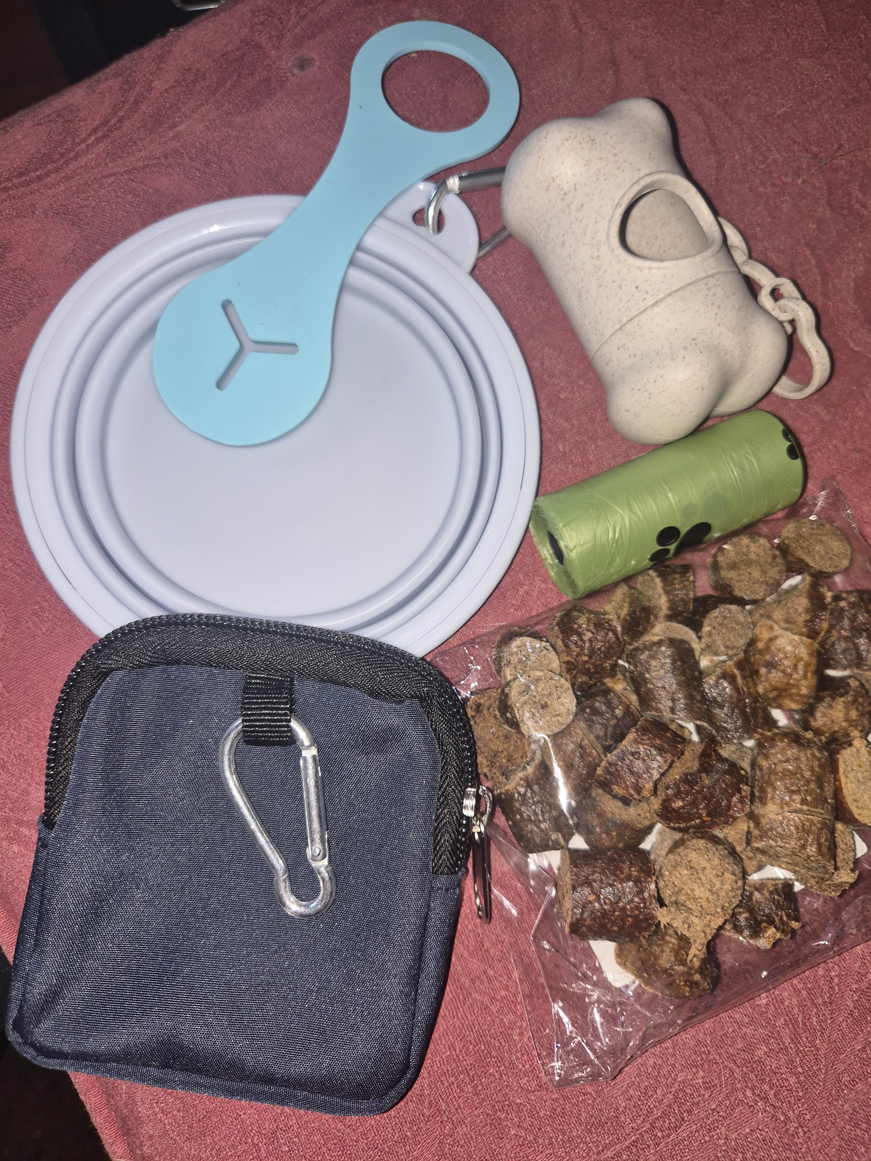 dog walking pack in various colours, includes, poo bags, water bowl, poo dispenser, poo bag holder, treat pouch & 50g of chopped sausages