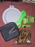 dog walking pack in various colours, includes, poo bags, water bowl, poo dispenser, poo bag holder, treat pouch & 50g of chopped sausages