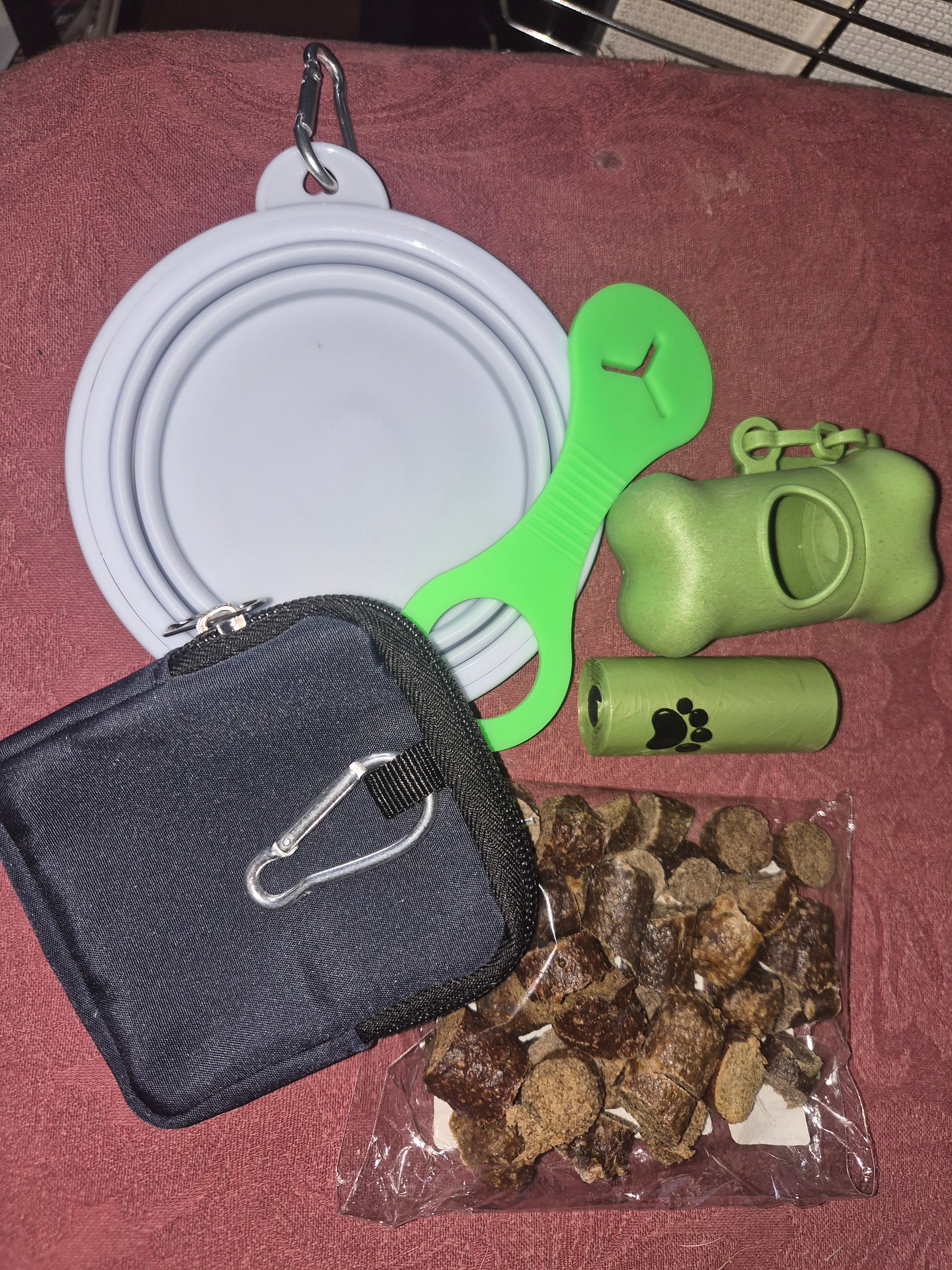 dog walking pack in various colours, includes, poo bags, water bowl, poo dispenser, poo bag holder, treat pouch & 50g of chopped sausages