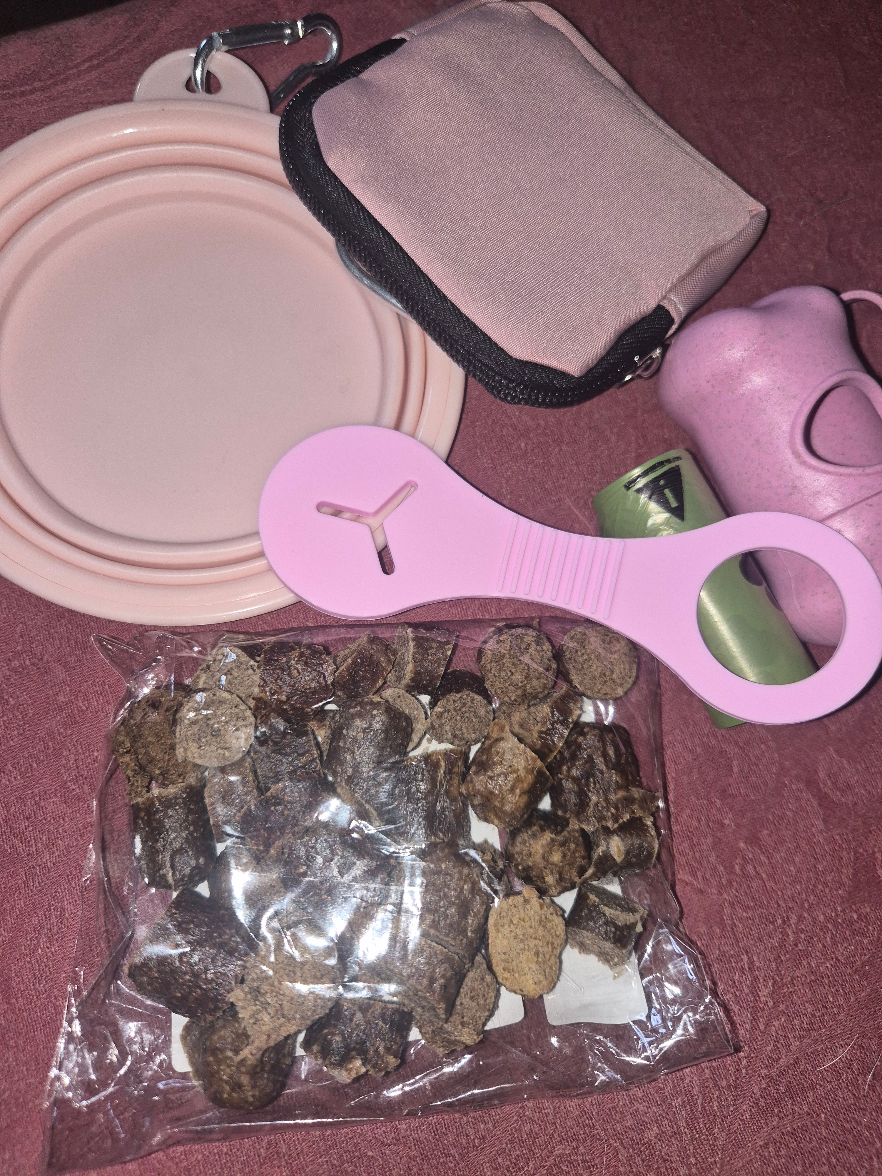 dog walking pack in various colours, includes, poo bags, water bowl, poo dispenser, poo bag holder, treat pouch & 50g of chopped sausages